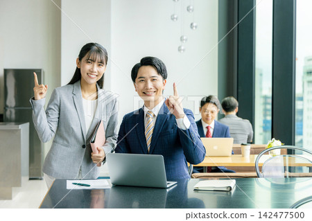 Businessmen having a meeting Businessmen having a meeting 142477500