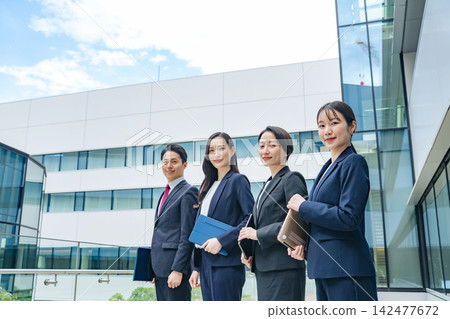 A group of business people standing side by side. Teamwork, colleagues, talent, unity, work, company, business, recruitment, management A group of business people standing side by side. Teamwork, colleagues, talent, unity, work, company, business, recruitment, management 142477672