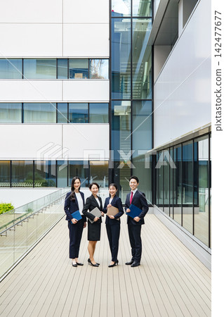 A group of business people standing side by side. Teamwork, colleagues, talent, unity, work, company, business, recruitment, management A group of business people standing side by side. Teamwork, colleagues, talent, unity, work, company, business, recruitment, management 142477677