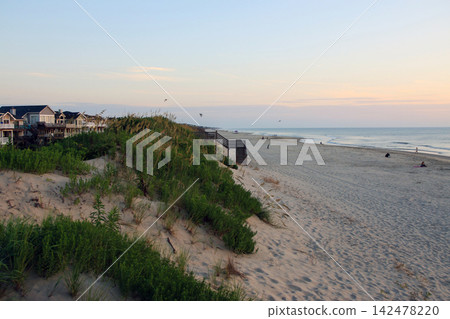 Enjoying the Beach From Above in Corolla, North Carolina During Sunset Hours Enjoying the Beach From Above in Corolla, North Carolina During Sunset Hours 142478220