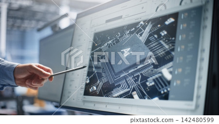 Engineer Pointing to AI Processor Microchip Design on Screen 142480599