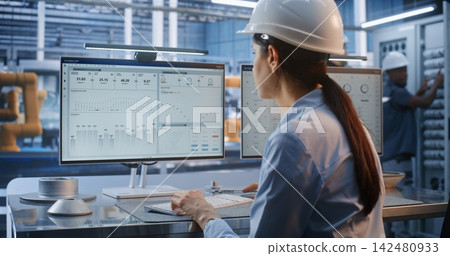 Female Engineer Designing 3D Automotive Parts in Smart Factory Female Engineer Designing 3D Automotive Parts in Smart Factory 142480933