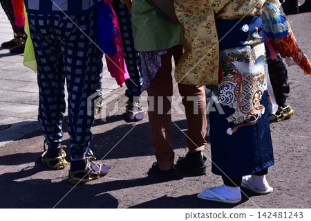Men participating in the Inuyama Spring Festival in Inuyama City, Aichi Prefecture, are seen wearing traditional happi coats, straw sandals, and brightly colored obi belts. Men participating in the Inuyama Spring Festival in Inuyama City, Aichi Prefecture, are seen wearing traditional happi coats, straw sandals, and brightly colored obi belts. 142481243