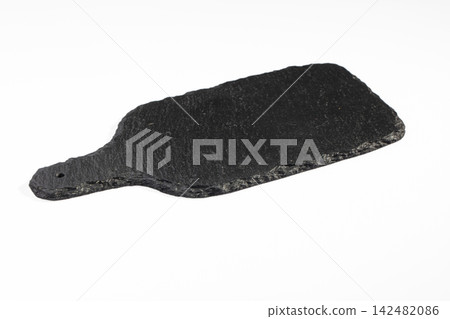 Black slate serving board with handle isolated on white background 142482086
