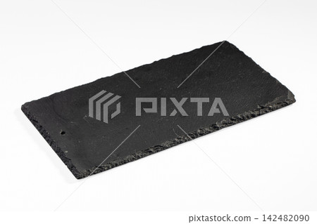 Black slate serving board with rough edges isolated on white background 142482090