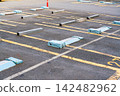 A landscape with a parking lot 142482962
