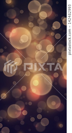 Defocused golden and orange glowing circles forming a dreamy, abstract light effect Defocused golden and orange glowing circles forming a dreamy, abstract light effect 142482993