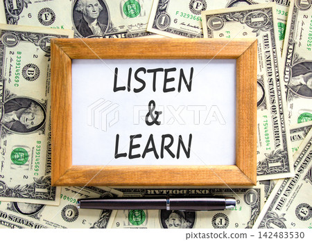Listen and learn words symbol. Concept words Listen and learn on beautiful wooden picture frame. Beautiful dollar bills background. Dollar bills. Business listen and learn support concept. Copy space. Listen and learn words symbol. Concept words Listen and learn on beautiful wooden picture frame. Beautiful dollar bills background. Dollar bills. Business listen and learn support concept. Copy space. 142483530