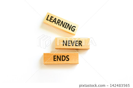 Learning never ends words symbol. Concept words Learning never ends on beautiful wooden blocks. Beautiful white background. Business support motivational and learning never ends concept. Copy space. Learning never ends words symbol. Concept words Learning never ends on beautiful wooden blocks. Beautiful white background. Business support motivational and learning never ends concept. Copy space. 142483565