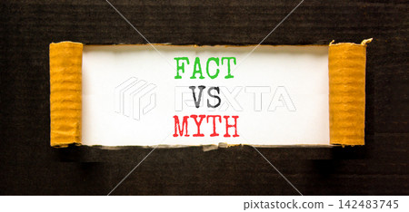 Fact vs versus myth words symbol. Concept words Fact vs Myth on beautiful white paper. Beautiful black background. Business and fact vs versus myth concept. Copy space. Fact vs versus myth words symbol. Concept words Fact vs Myth on beautiful white paper. Beautiful black background. Business and fact vs versus myth concept. Copy space. 142483745