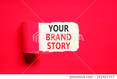 Branding and your brand story symbol. Concept words Your brand story on beautiful white paper. Beautiful red paper background. Business branding your brand story concept. Copy space. Branding and your brand story symbol. Concept words Your brand story on beautiful white paper. Beautiful red paper background. Business branding your brand story concept. Copy space. 142483757