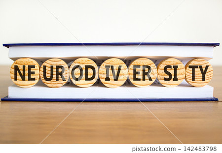 Neurodiversity word symbol. Concept word Neurodiversity on beautiful wooden circles in book. Beautiful white background. Business science biological medical neurodiversity word concept. Copy space. Neurodiversity word symbol. Concept word Neurodiversity on beautiful wooden circles in book. Beautiful white background. Business science biological medical neurodiversity word concept. Copy space. 142483798