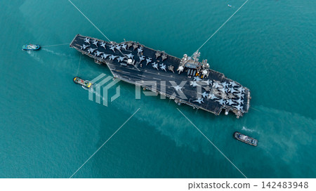 Aerial view nuclear powered aircraft carrier, USA navy ship carrier airplane fighter jet aircraft army navy nuclear ship carrier full fighter jet aircraft technology of battleship. 142483948