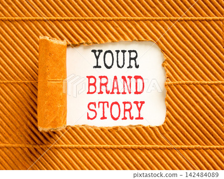 Branding and your brand story symbol. Concept words Your brand story on beautiful white paper. Beautiful brown paper background. Business branding your brand story concept. Copy space. 142484089