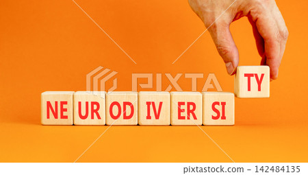Neurodiversity word symbol. Concept word Neurodiversity on beautiful wooden blocks. Beautiful orange table orange background. Business science biological medical neurodiversity word concept Copy space 142484135