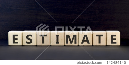 Estimate word symbol. Concept word Estimate on beautiful wooden blocks. Beautiful black background. Business support help estimate word concept. Copy space. Estimate word symbol. Concept word Estimate on beautiful wooden blocks. Beautiful black background. Business support help estimate word concept. Copy space. 142484140