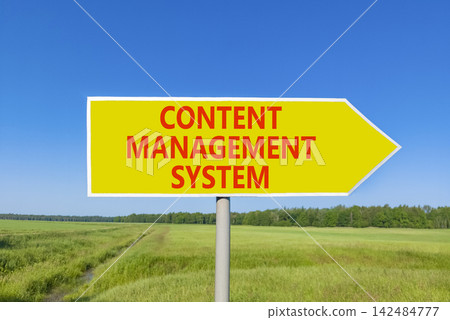 Content management system symbol. Concept words Content management system on beautiful yellow road sign. Beautiful blue sky grass background. Business content management system concept. Copy space. 142484777