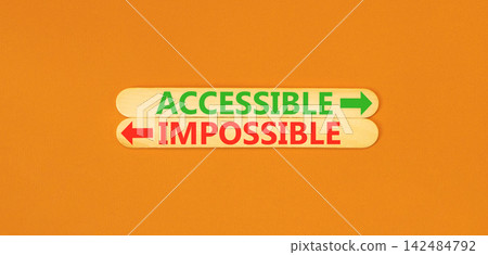 Accessible or impossible symbol. Concept words Accessible or Impossible on beautiful wooden sticks. Beautiful orange background. Business accessible or impossible concept. Copy space. Accessible or impossible symbol. Concept words Accessible or Impossible on beautiful wooden sticks. Beautiful orange background. Business accessible or impossible concept. Copy space. 142484792