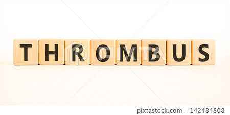 Thrombus word symbol. Concept word Thrombus on beautiful wooden blocks. Beautiful white background. Business medical support help thrombus word concept. Copy space. Thrombus word symbol. Concept word Thrombus on beautiful wooden blocks. Beautiful white background. Business medical support help thrombus word concept. Copy space. 142484808