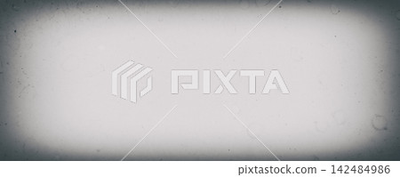 Vintage film texture background with dark vignette border and film grain overlay 142484986