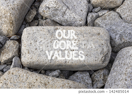 Our core values words symbol. Concept words Our core values on beautiful grey stone. Beautiful grey stones background. Business our core values motivational support concept. Copy space. Our core values words symbol. Concept words Our core values on beautiful grey stone. Beautiful grey stones background. Business our core values motivational support concept. Copy space. 142485014