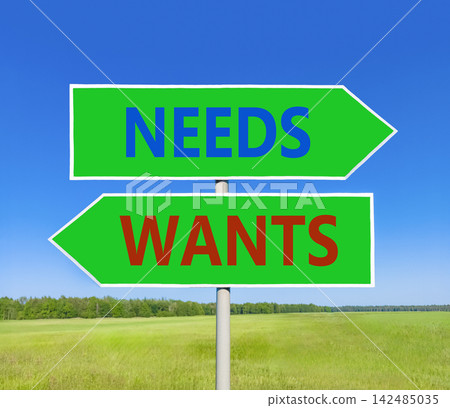 Needs instead wants words symbol. Concept words Needs Wants on beautiful green road sign. Beautiful blue sky background. Business psychology needs or wants concept. Copy space. Needs instead wants words symbol. Concept words Needs Wants on beautiful green road sign. Beautiful blue sky background. Business psychology needs or wants concept. Copy space. 142485035