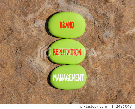 Brand reputation management words symbol. Concept words Brand reputation management on beautiful green stones. Beautiful stone background. Business brand reputation management concept. Copy space. 142485048