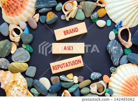Brand and reputation words symbol. Concept words Brand and reputation on beautiful wooden blocks. Sea stones and shells. Beautiful grey background. Business brand and reputation concept. Copy space. Brand and reputation words symbol. Concept words Brand and reputation on beautiful wooden blocks. Sea stones and shells. Beautiful grey background. Business brand and reputation concept. Copy space. 142485062