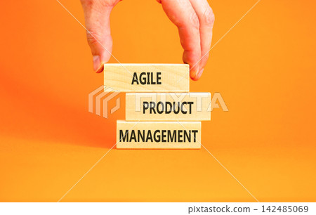 Agile product management words symbol. Concept words Agile product management on beautiful wooden blocks. Beautiful orange background. Business agile product management concept. Copy space. Agile product management words symbol. Concept words Agile product management on beautiful wooden blocks. Beautiful orange background. Business agile product management concept. Copy space. 142485069