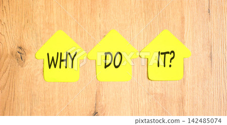 Why do it words symbol. Concept words Why do it on beautiful yellow paper houses. Beautiful wooden background. Business support motivational and Why do it concept. Copy space. Why do it words symbol. Concept words Why do it on beautiful yellow paper houses. Beautiful wooden background. Business support motivational and Why do it concept. Copy space. 142485074