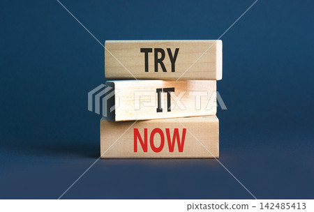 Try it now words symbol. Concept words Try is now on beautiful wooden blocks. Beautiful grey background. Business support motivational and try is now concept. Copy space. Try it now words symbol. Concept words Try is now on beautiful wooden blocks. Beautiful grey background. Business support motivational and try is now concept. Copy space. 142485413