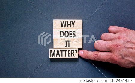Why does it matter words symbol. Concept words Why does it matter on beautiful wooden blocks. Beautiful grey background. Businessman hand. Business support why does it matter concept. Copy space. Why does it matter words symbol. Concept words Why does it matter on beautiful wooden blocks. Beautiful grey background. Businessman hand. Business support why does it matter concept. Copy space. 142485430