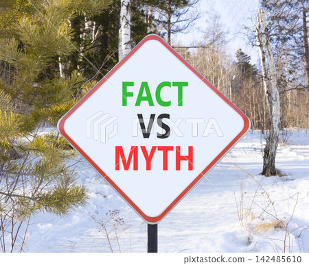 Fact vs versus myth words symbol. Concept words Fact vs Myth on beautiful white road sign. Beautiful winter forest background. Business and fact vs versus myth concept. Copy space. Fact vs versus myth words symbol. Concept words Fact vs Myth on beautiful white road sign. Beautiful winter forest background. Business and fact vs versus myth concept. Copy space. 142485610