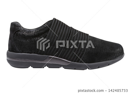 Black suede womens slip-on sneaker with elastic straps isolated on white background. Casual shoe side view Black suede womens slip-on sneaker with elastic straps isolated on white background. Casual shoe side view 142485733