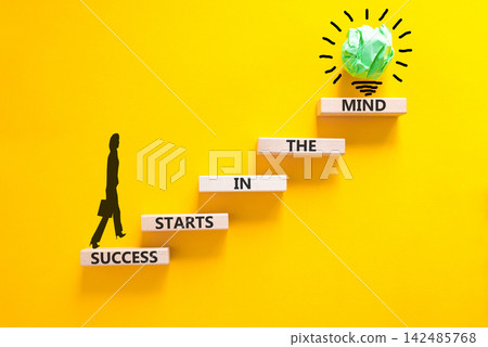 Success starts in the mind symbol. Concept words Success starts in the mind on beautiful wooden blocks. Beautiful yellow background. Business and success starts in the mind concept. Copy space. 142485768