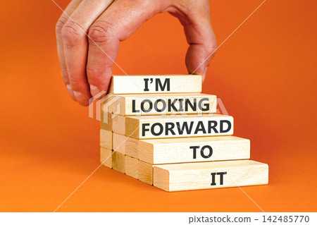I'm looking forward to it symbol. Concept words I'm looking forward to it on beautiful wooden blocks. Beautiful orange background. Business and I'm looking forward to it concept. Copy space. I'm looking forward to it symbol. Concept words I'm looking forward to it on beautiful wooden blocks. Beautiful orange background. Business and I'm looking forward to it concept. Copy space. 142485770