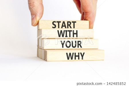 Start with your why words symbol. Concept words Start with your why on beautiful wooden blocks. Beautiful white background. Businessman hand. Business start with your why concept. Copy space. Start with your why words symbol. Concept words Start with your why on beautiful wooden blocks. Beautiful white background. Businessman hand. Business start with your why concept. Copy space. 142485852