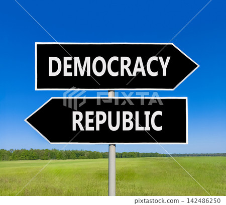 Democracy or republic words symbol. Concept words Democracy Republic on beautiful black road sign. Beautiful blue sky background. Business democracy republic concept. Copy space Democracy or republic words symbol. Concept words Democracy Republic on beautiful black road sign. Beautiful blue sky background. Business democracy republic concept. Copy space 142486250
