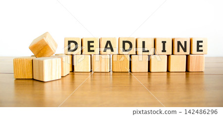 Deadline word symbol. Concept word Deadline on beautiful wooden blocks. Beautiful wooden table white background. Business support help deadline word concept. Copy space. Deadline word symbol. Concept word Deadline on beautiful wooden blocks. Beautiful wooden table white background. Business support help deadline word concept. Copy space. 142486296