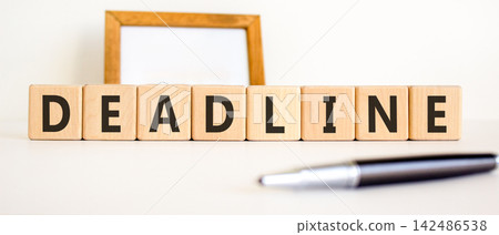 Deadline word symbol. Concept word Deadline on beautiful wooden blocks. Beautiful white background. Beautiful black pen. Business support help deadline word concept. Copy space. Deadline word symbol. Concept word Deadline on beautiful wooden blocks. Beautiful white background. Beautiful black pen. Business support help deadline word concept. Copy space. 142486538