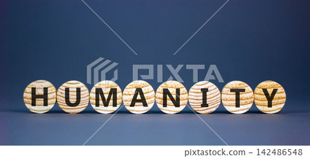 Humanity word symbol. Concept word Humanity on beautiful wooden circles. Beautiful grey background. Business support help humanity word concept. Copy space. 142486548