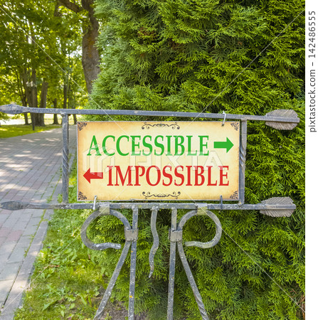 Accessible or impossible symbol. Concept words Accessible or Impossible on beautiful information road sign. Beautiful green tree background. Business accessible or impossible concept. Copy space. Accessible or impossible symbol. Concept words Accessible or Impossible on beautiful information road sign. Beautiful green tree background. Business accessible or impossible concept. Copy space. 142486555