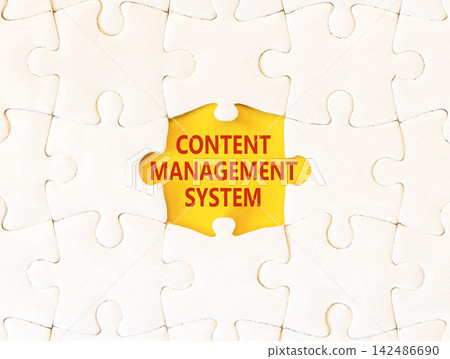 Content management system symbol. Concept words Content management system on beautiful white puzzle. Beautiful yellow background. Business content management system concept. Copy space. Content management system symbol. Concept words Content management system on beautiful white puzzle. Beautiful yellow background. Business content management system concept. Copy space. 142486690