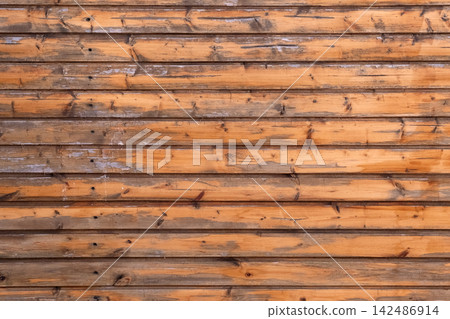 Wooden planks forming a rustic and aged horizontal surface, offering a natural texture and pattern suitable for various background applications Wooden planks forming a rustic and aged horizontal surface, offering a natural texture and pattern suitable for various background applications 142486914