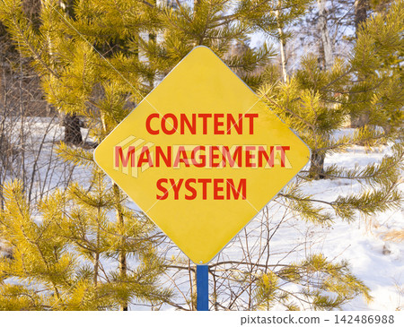 Content management system symbol. Concept words Content management system on beautiful yellow road sign. Beautiful winter forest background. Business content management system concept. Copy space. Content management system symbol. Concept words Content management system on beautiful yellow road sign. Beautiful winter forest background. Business content management system concept. Copy space. 142486988