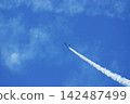 Blue Impulse flying in the blue sky 142487499
