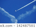 Blue Impulse flying in the blue sky 142487501
