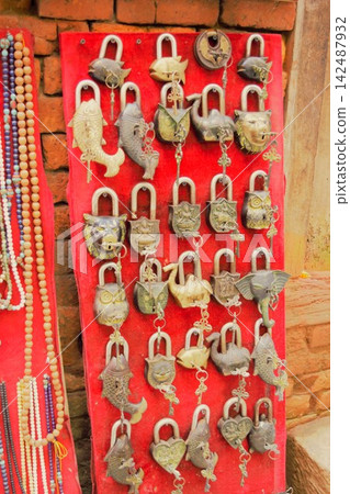 Animal-themed decorative padlocks displayed in souvenir shops in Bhaktapur, Nepal. Animal-themed decorative padlocks displayed in souvenir shops in Bhaktapur, Nepal. 142487932