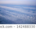 The sea of clouds seen from an airplane 142488330