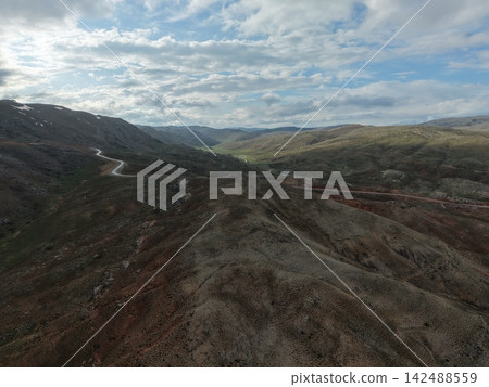 Mountainous winding road. rocky mountains. High quality 4k footage Mountainous winding road. rocky mountains. High quality 4k footage 142488559